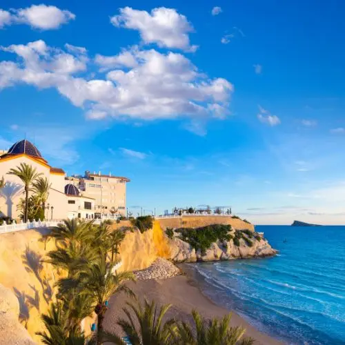 Beautiful beach in Altea on the Costa Blanca with Mediterranean Sea views and the iconic blue-domed church on the hill