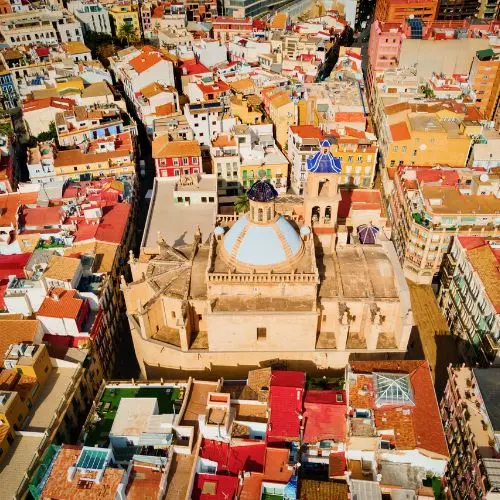 Blue dome of the Co-Cathedral of San Nicolás in Alicante with sea views