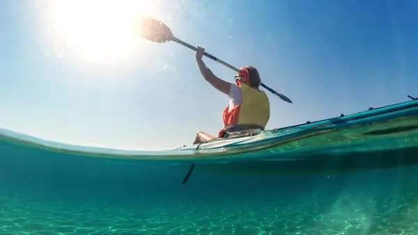 Kayaking in crystal-clear Mediterranean waters along the Alicante coast